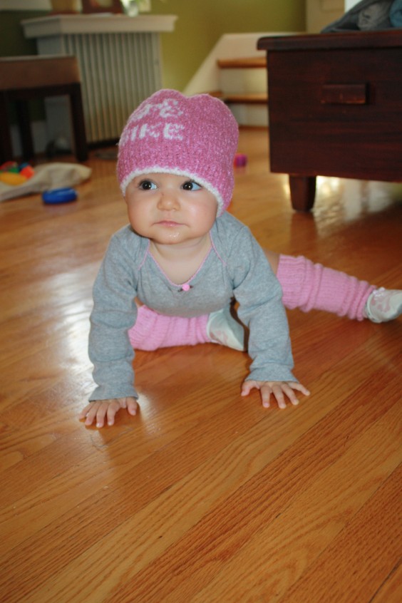 Laura's daughter wearinga bike hat Laura made